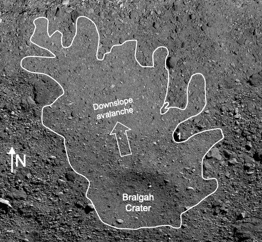 Image of asteroid Bennu's surface with a squiggly outline showing where debris flowed during a landslide with written labels on top