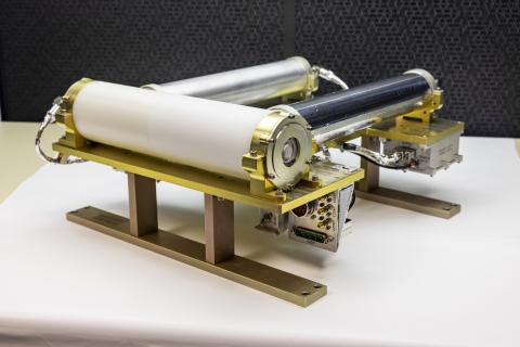 Image of the three cylinders of Psyche's neutron spectrometer 
